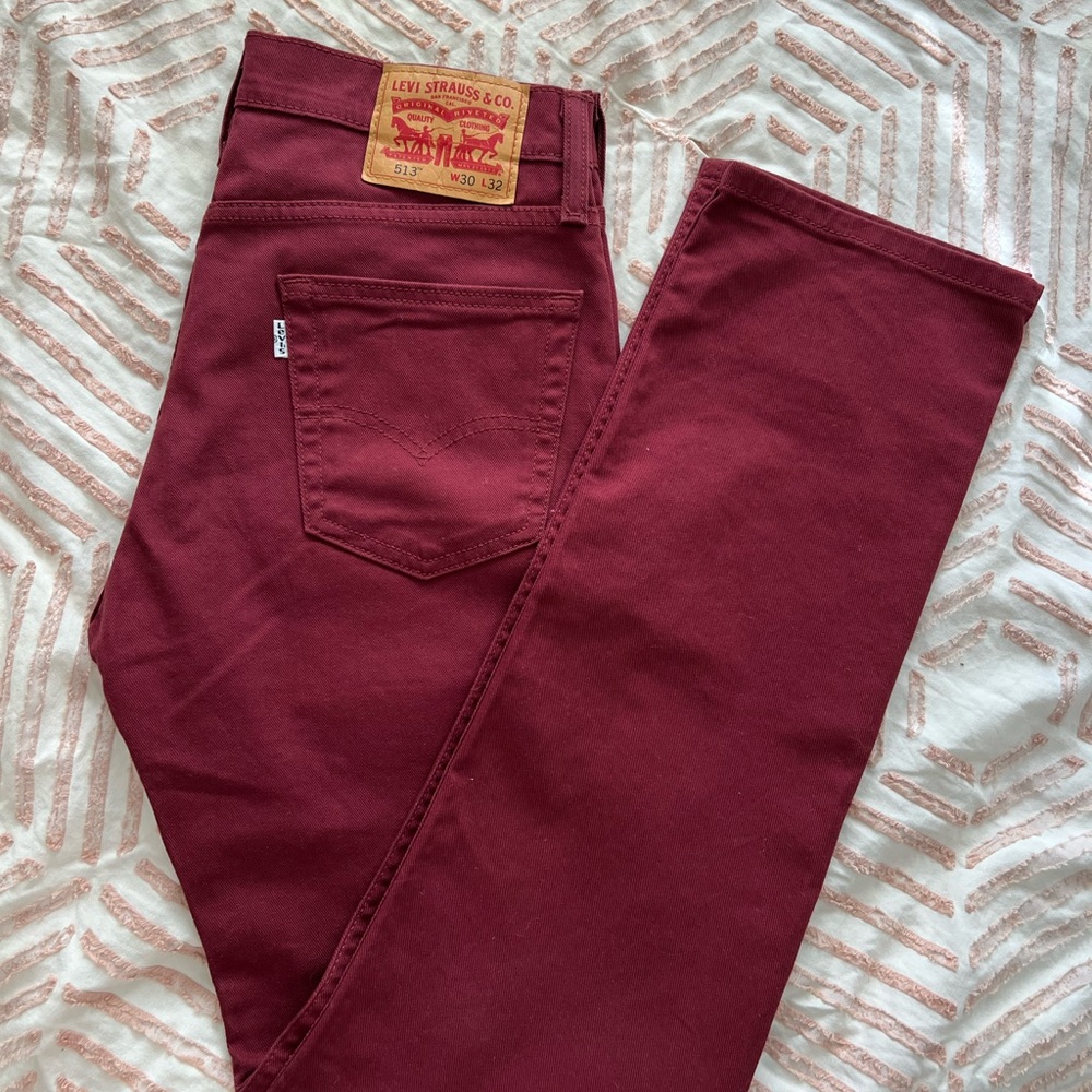 Levi’s men’s 513 jeans. Dark red. 30x32”. Worn once.